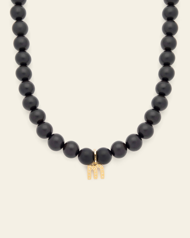 Hero Image of a 15mm Dark Boule Initial Necklace that includes a 15mm Dark Boulé Necklace and a Gold Vermeil AlphaBet Initial M on a white background.