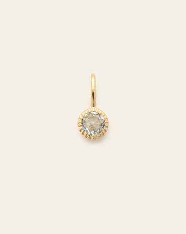 10k solid gold aquamarine birthstone pendant charm with round faceted light blue gemstone in a minimalist fine jewelry design
