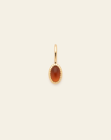 10k solid gold citrine birthstone pendant charm with oval faceted orange red gemstone in a minimalist fine jewelry design