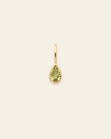 10k solid gold peridot birthstone pendant charm with teardrop faceted green gemstone in a minimalist fine jewelry design
