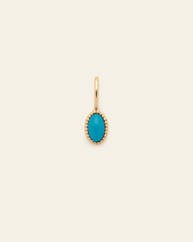 10k solid gold turquoise birthstone pendant charm with oval bezel blue gemstone in a minimalist fine jewelry design