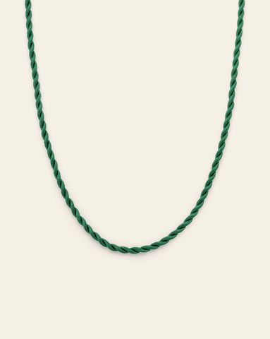 Deep sea green twisted cord necklace displayed in a curve against a neutral background.