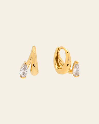 Elegant gold vermeil earrings with spiral design and teardrop cubic zirconia stones. 
