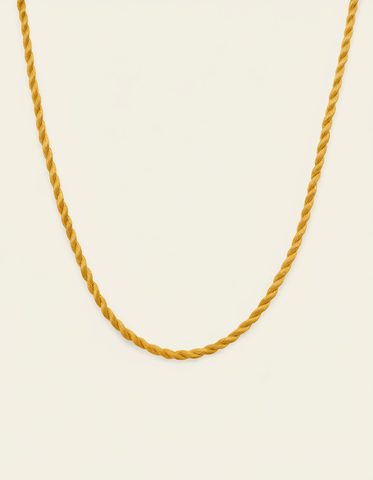 Twisted rope-style ochre cord necklace with a polished finish displayed on a neutral background