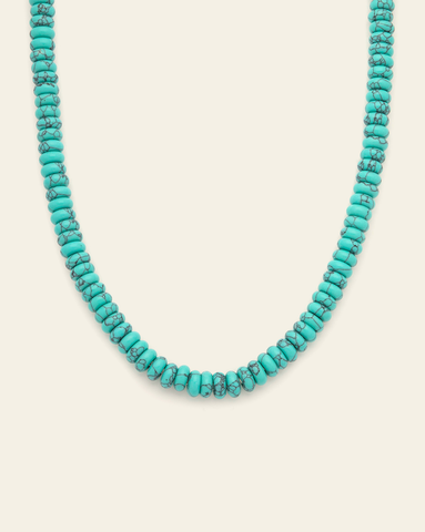 Turquoise semi precious gemstone bead necklace with smooth rondelle beads on a twisted cord rope necklace