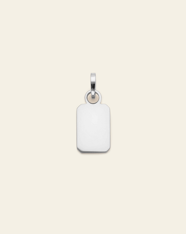 Sterling Silver Tag Charm with a polished surface, designed for engraving and layering on necklaces or bracelets.